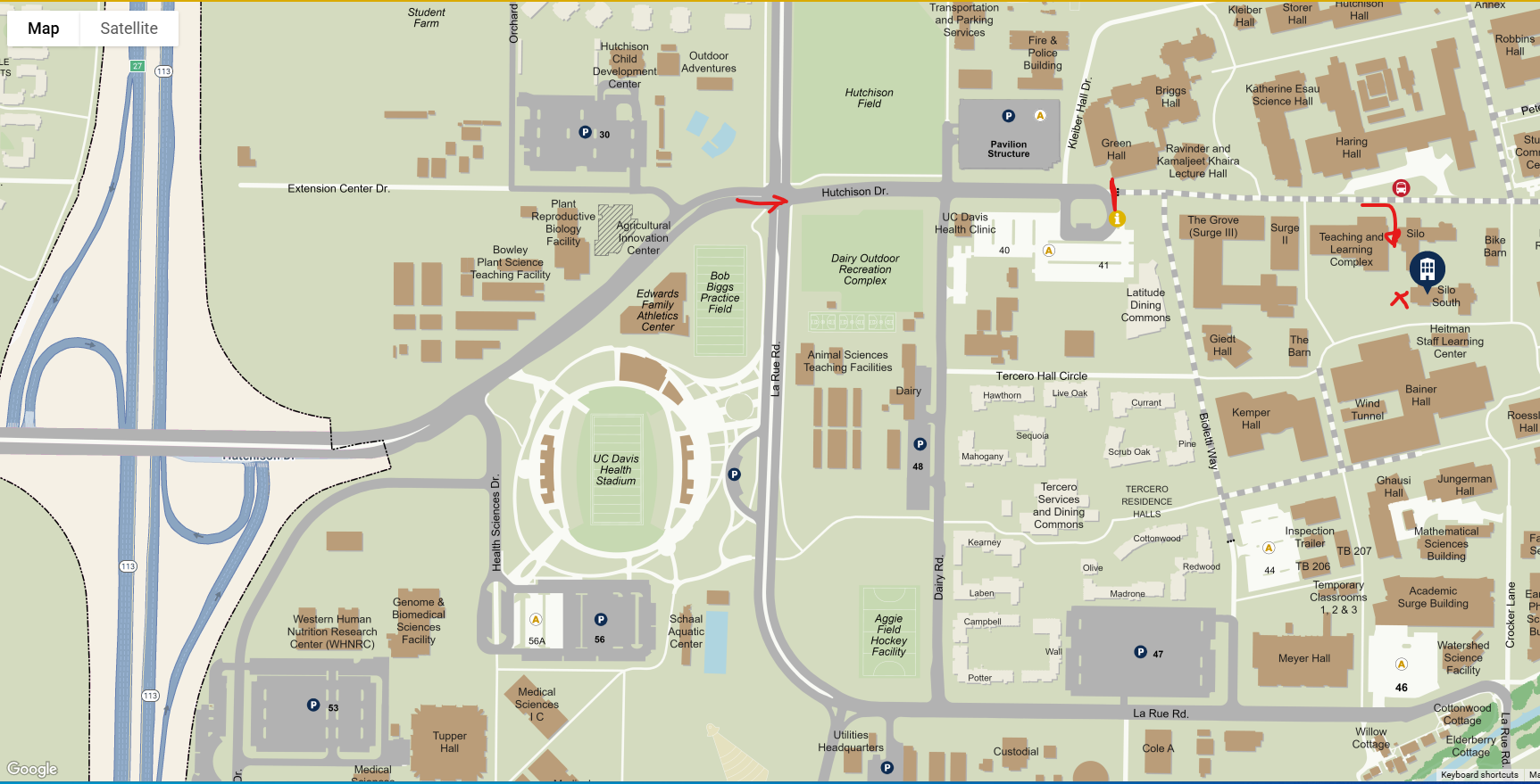 a map with roads and little red arrows showing the path to the Craft Center