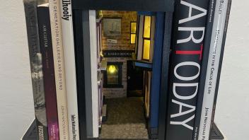 Book case sculpture of a book store