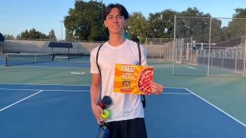 This photo shows the winner of open singles tennis.