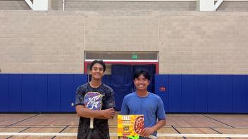 This photo shows the winners of pickleball doubles.