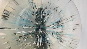 clear and blue streaky fused plate in a stand