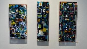 tryptic of fused glass with dark blue motif