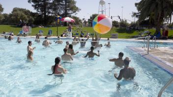 student in rec pool