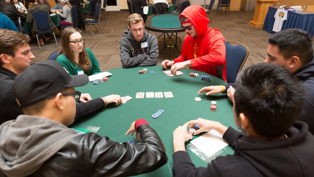 Boys and girls playing Poker