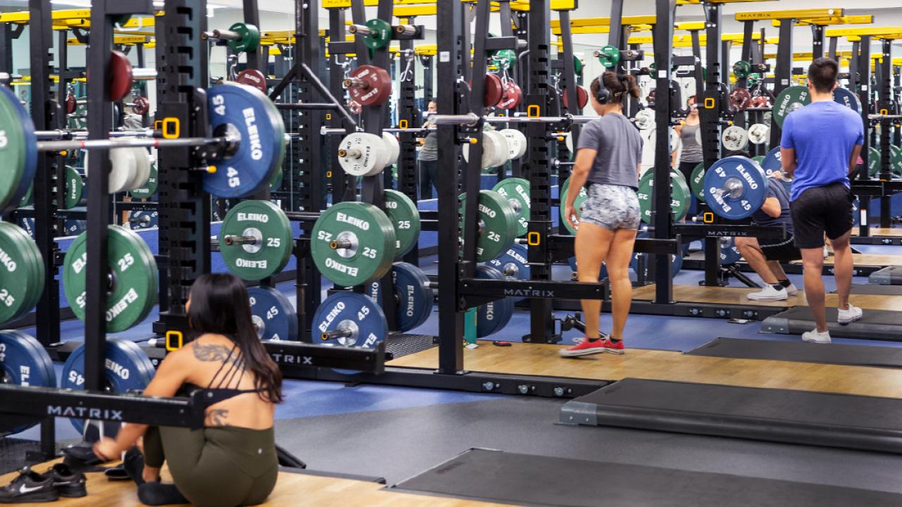 People exercising in the ARC weight room