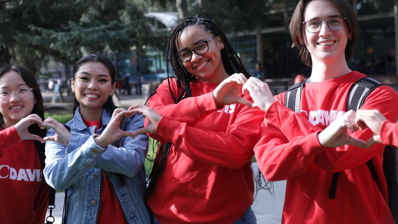 Students at the Memorial Union wearing Valentines Day merchandise.
