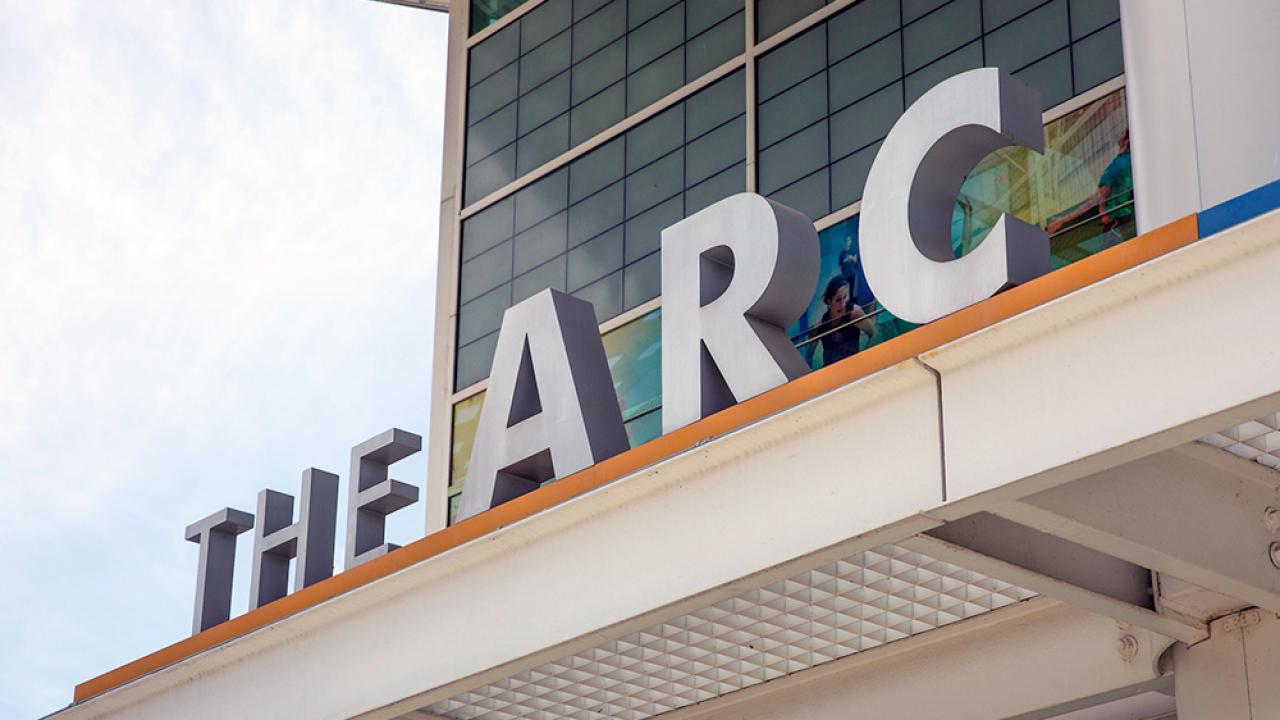 Sign on the front of the Activities and Recreation Center which reads "The ARC" in block letters