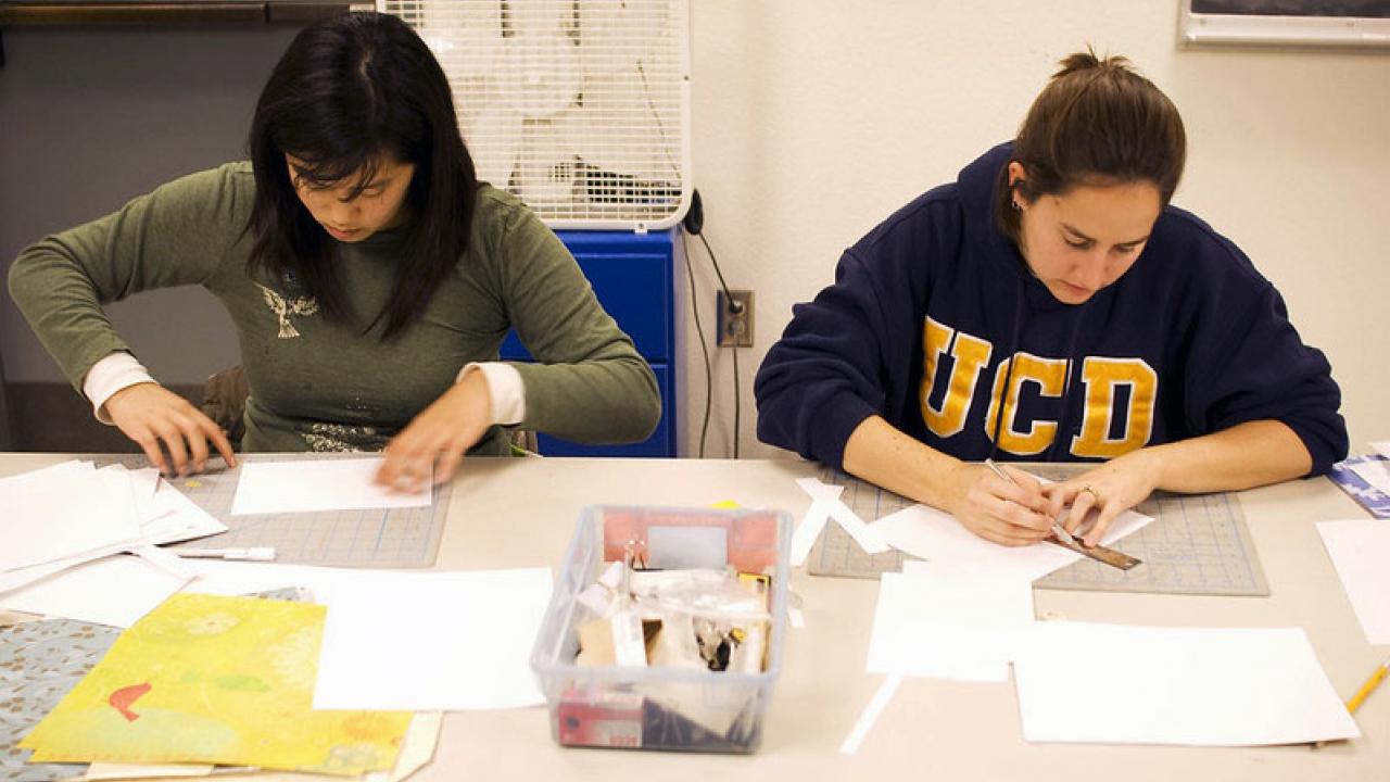 Two students drawing at the Craft Center