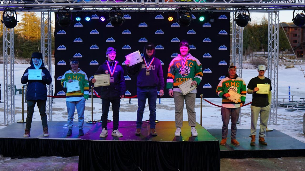 Justin Wallasch shown with his first place Skier Cross medal that he won in the 2022 U.S. Collegiate Skiing and Snowboarding National Championships™