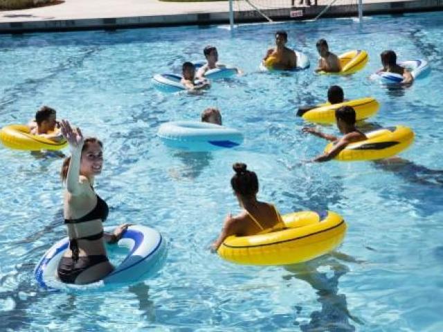 students playing tube polo at the rec pool