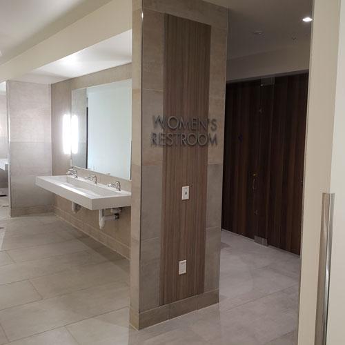 view of sink and women's restroom area