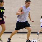 Photo of Chris playing indoor soccer
