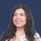 Headshot of Gabbi in front of a blue background