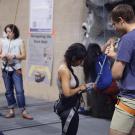 Students tying into their harnesses at the ARC Rock Wall