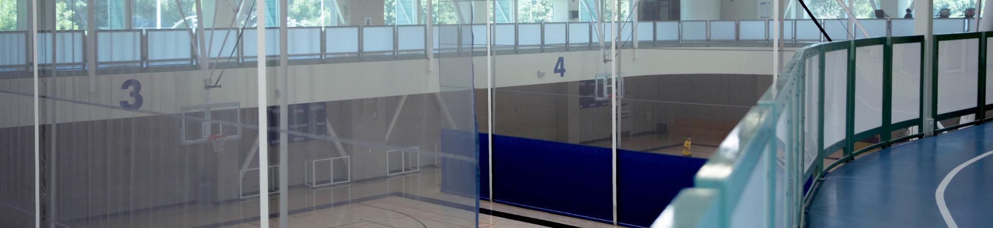 Photo of empty running track and basketball court