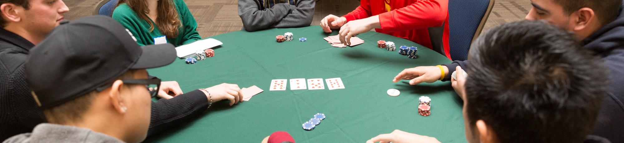 Boys and girls playing Poker