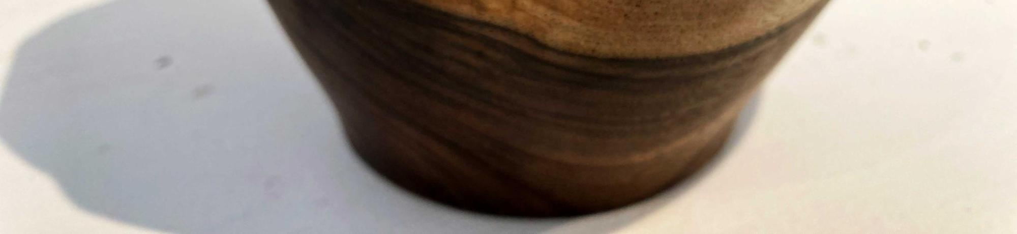 large wood turned bowl with asymmetrical rim
