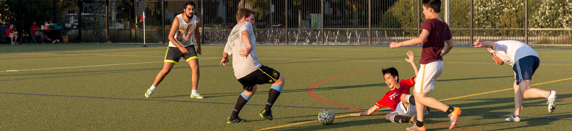 Students playing soccer
