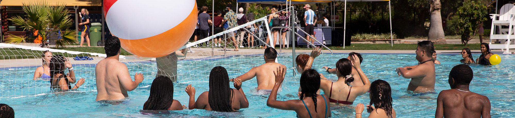 Students playing in pool