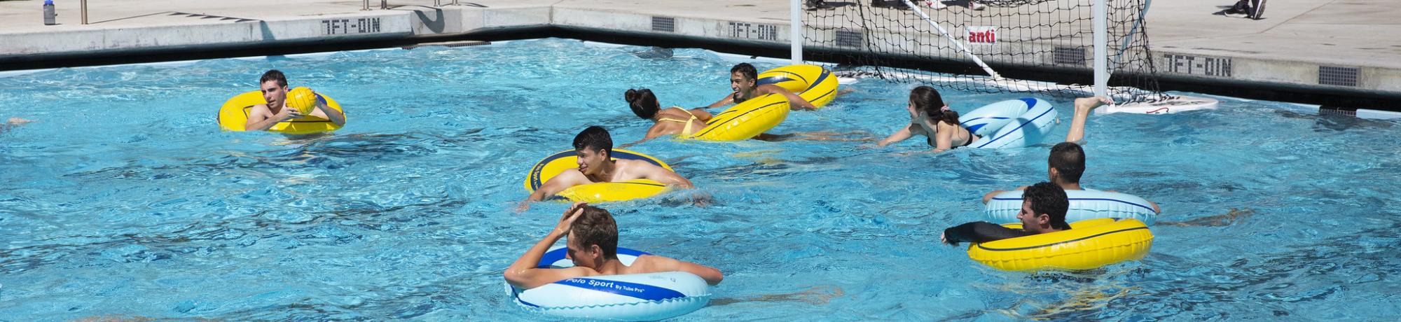 Boys and Girls Playing Tube Pool at Rec Pool